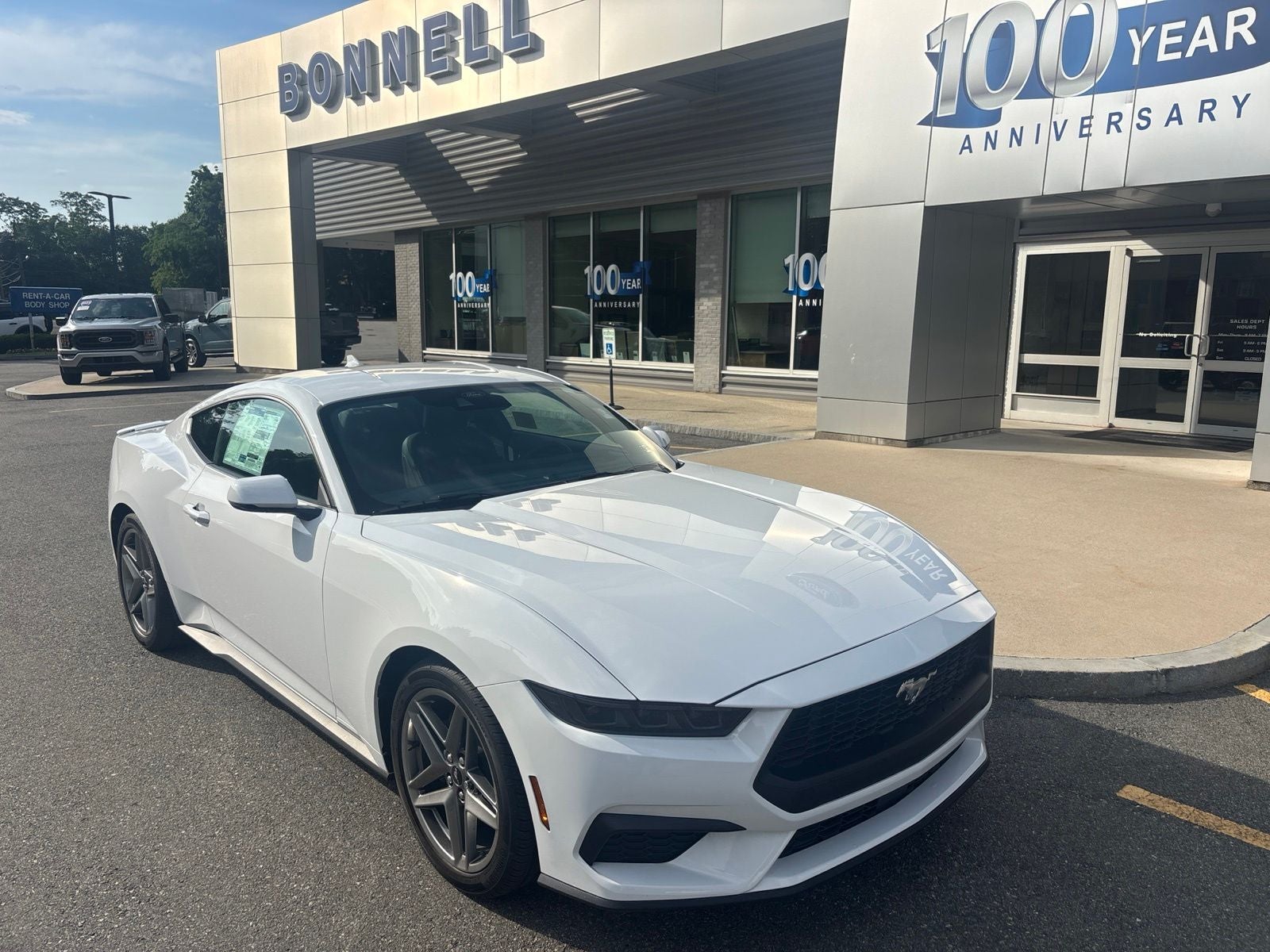 2026 Ford Mustang EcoBoost Premium in Oxford White — front three-quarter view
