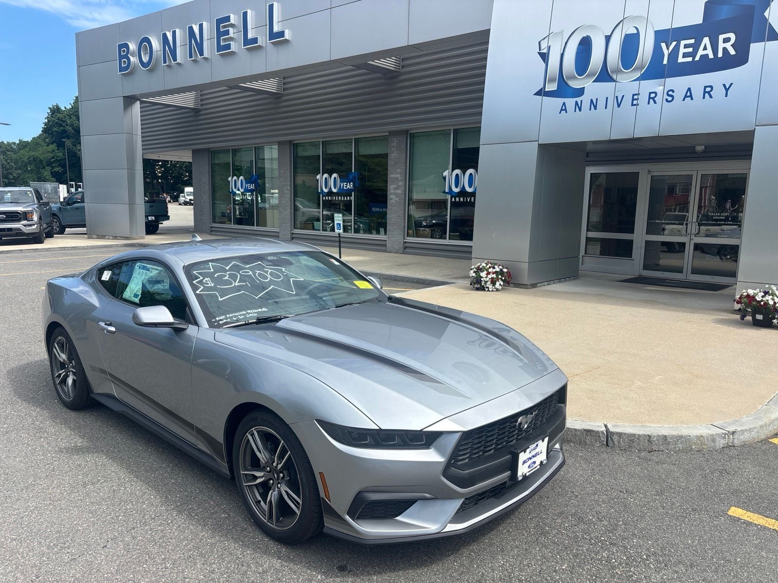 2025 Ford Mustang EcoBoost in Iconic Silver Metallic — front three-quarter view