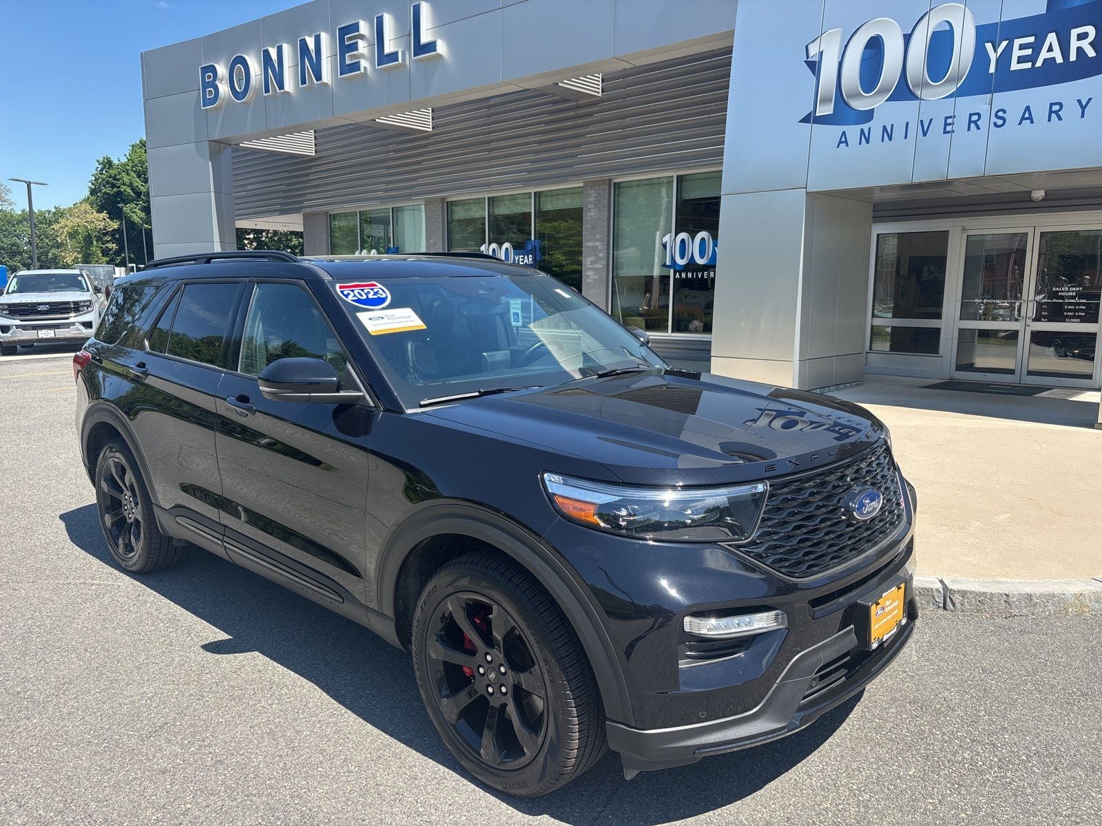 2023 Ford Explorer ST in Agate Black Metallic — front three-quarter view