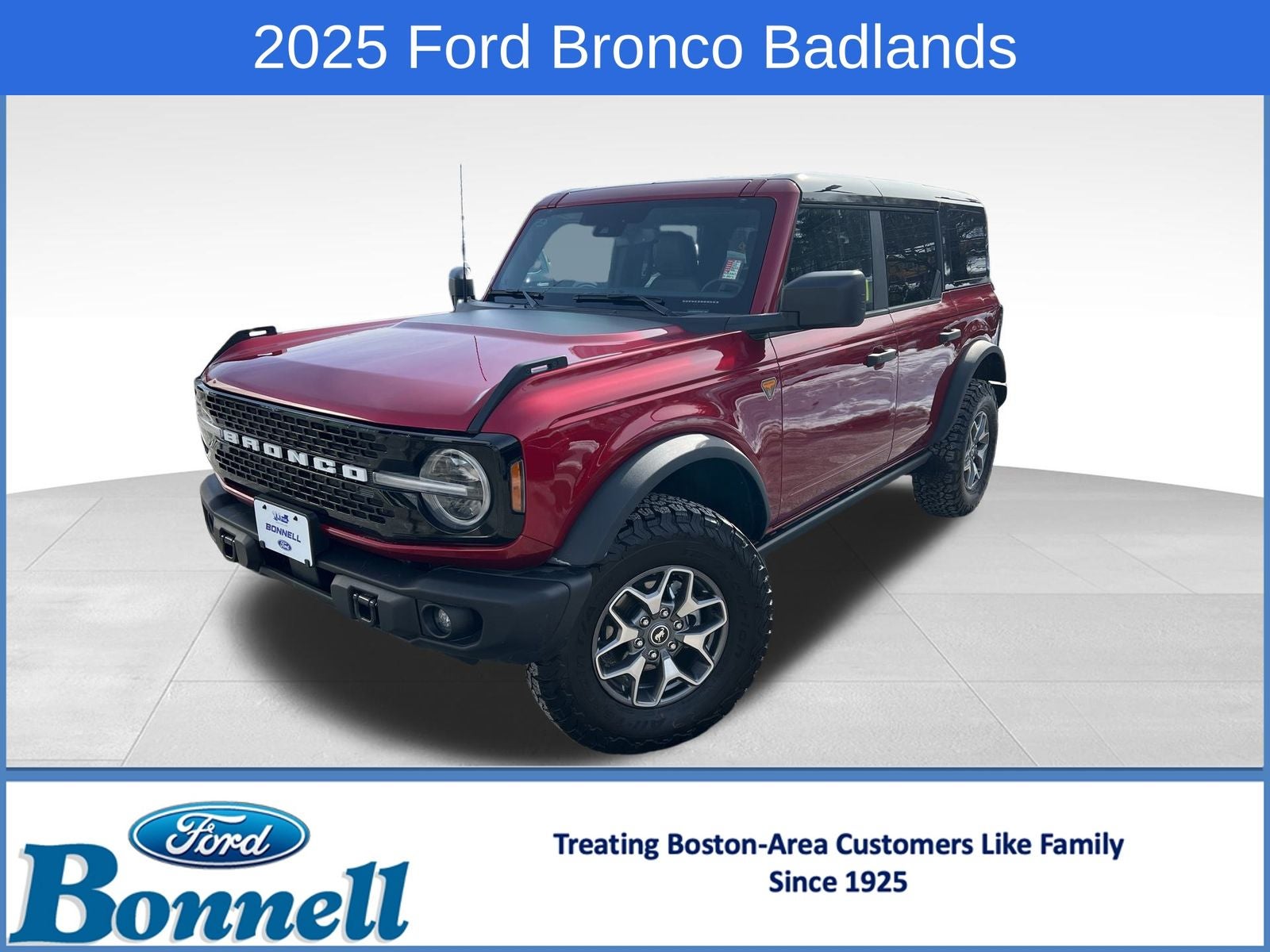 2025 Ford Bronco Badlands in Ruby Red Metallic Tinted Clearcoat — front three-quarter view