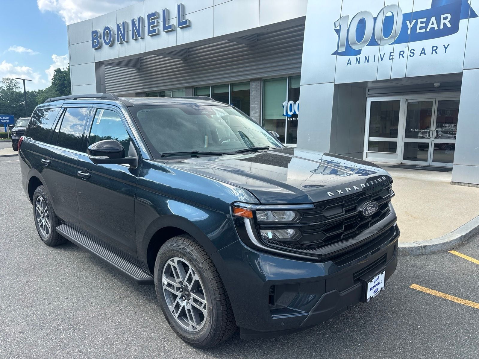 2026 Ford Expedition Active in Stone Blue Metallic — front three-quarter view