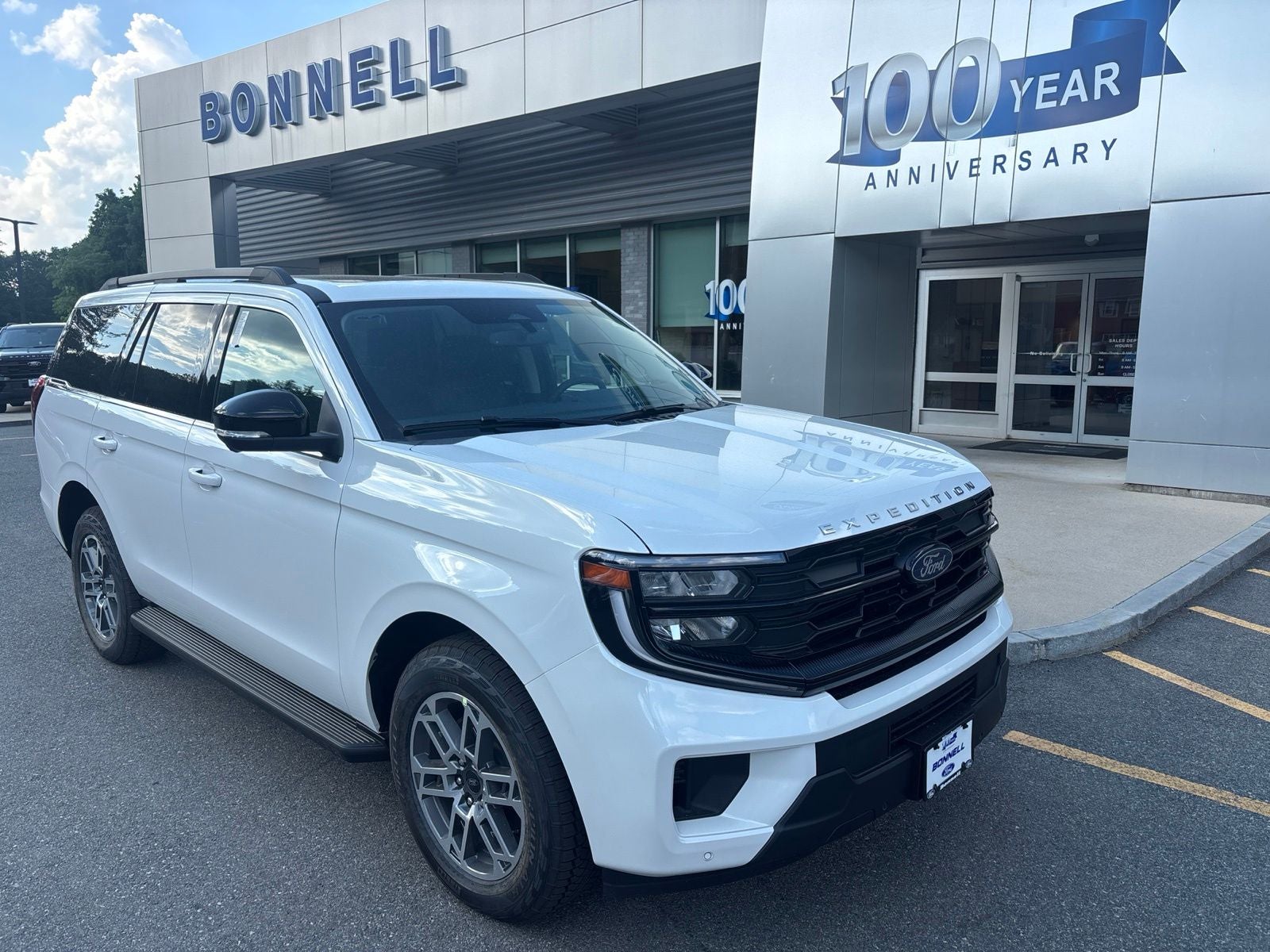 2026 Ford Expedition Active in Star White Metallic Tri-Coat — front three-quarter view