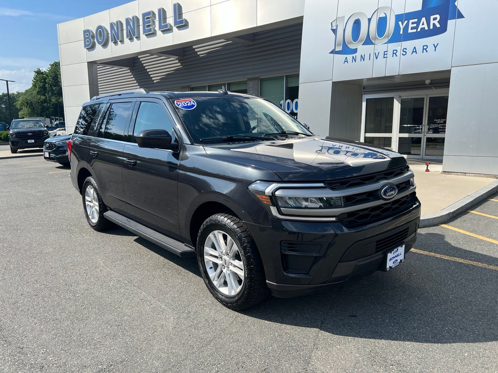 2024 Ford Expedition XLT in Dark Matter Gray Metallic — front three-quarter view