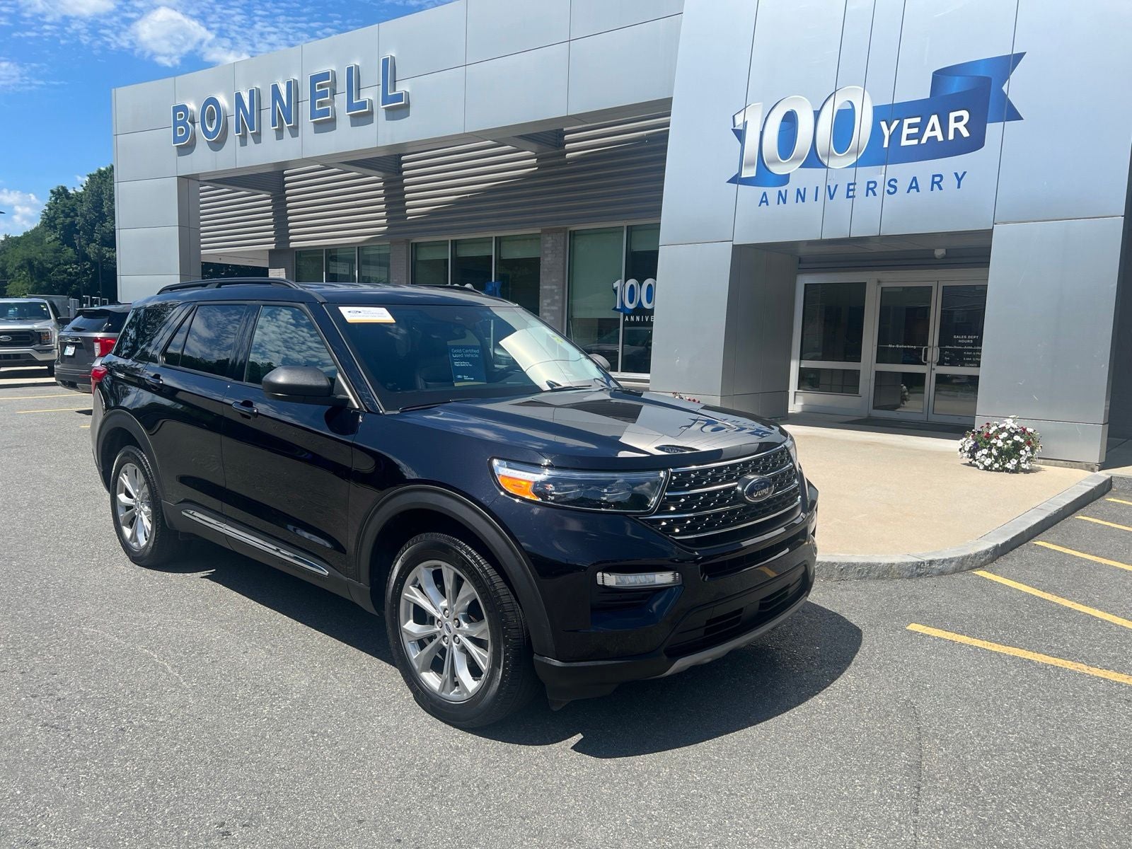 2023 Ford Explorer XLT in Agate Black Metallic — front three-quarter view