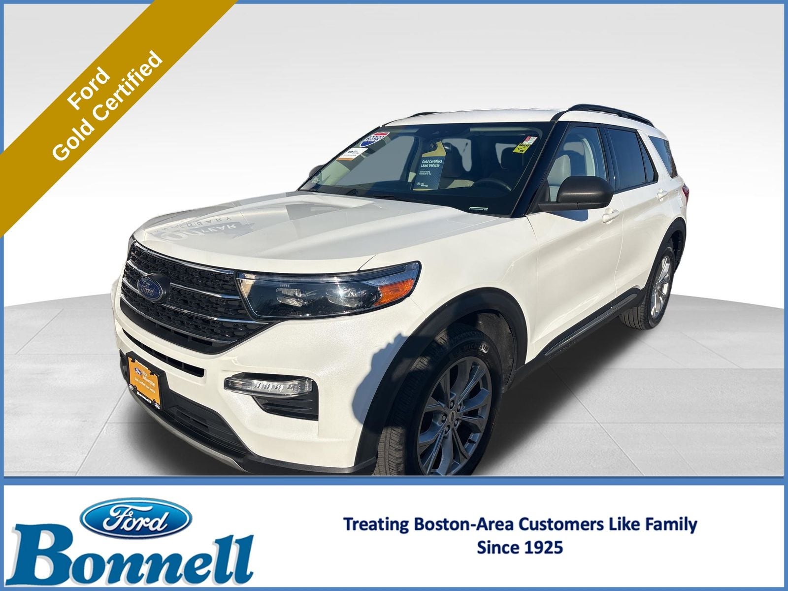 2023 Ford Explorer XLT in White Metallic — front three-quarter view