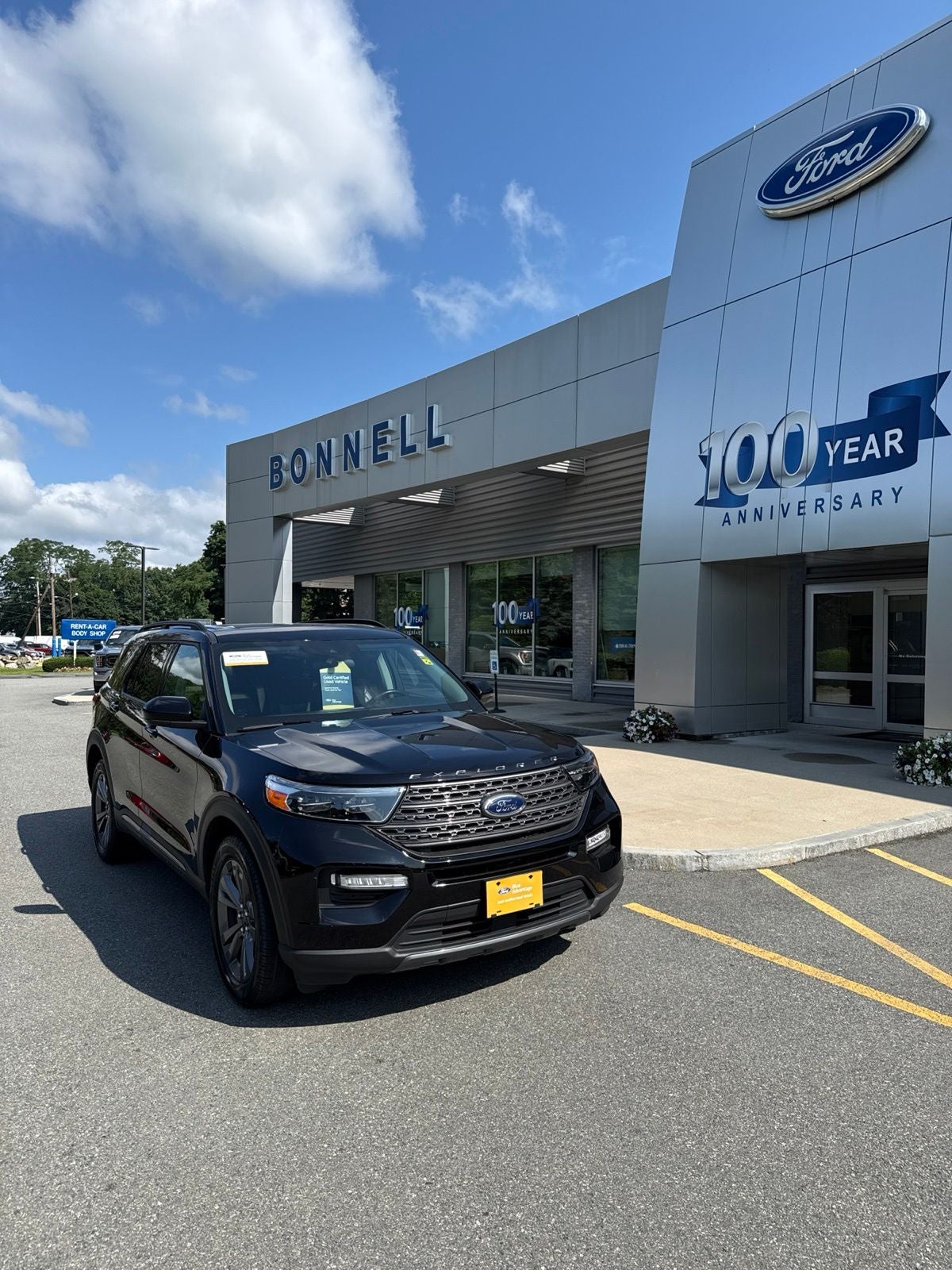 2023 Ford Explorer XLT in Agate Black Metallic — front three-quarter view