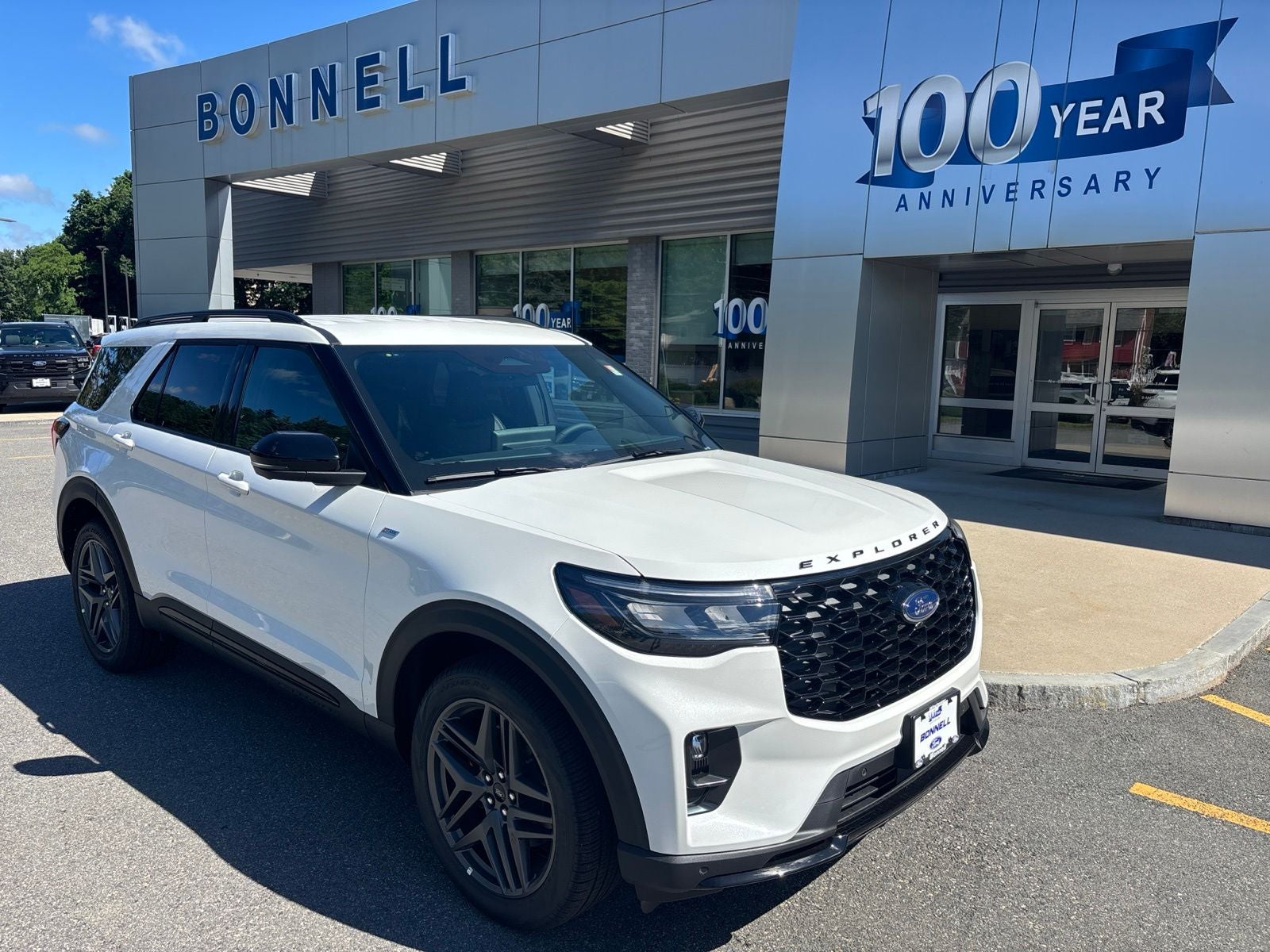 2026 Ford Explorer ST-Line in Star White Metallic Tri-Coat — front three-quarter view