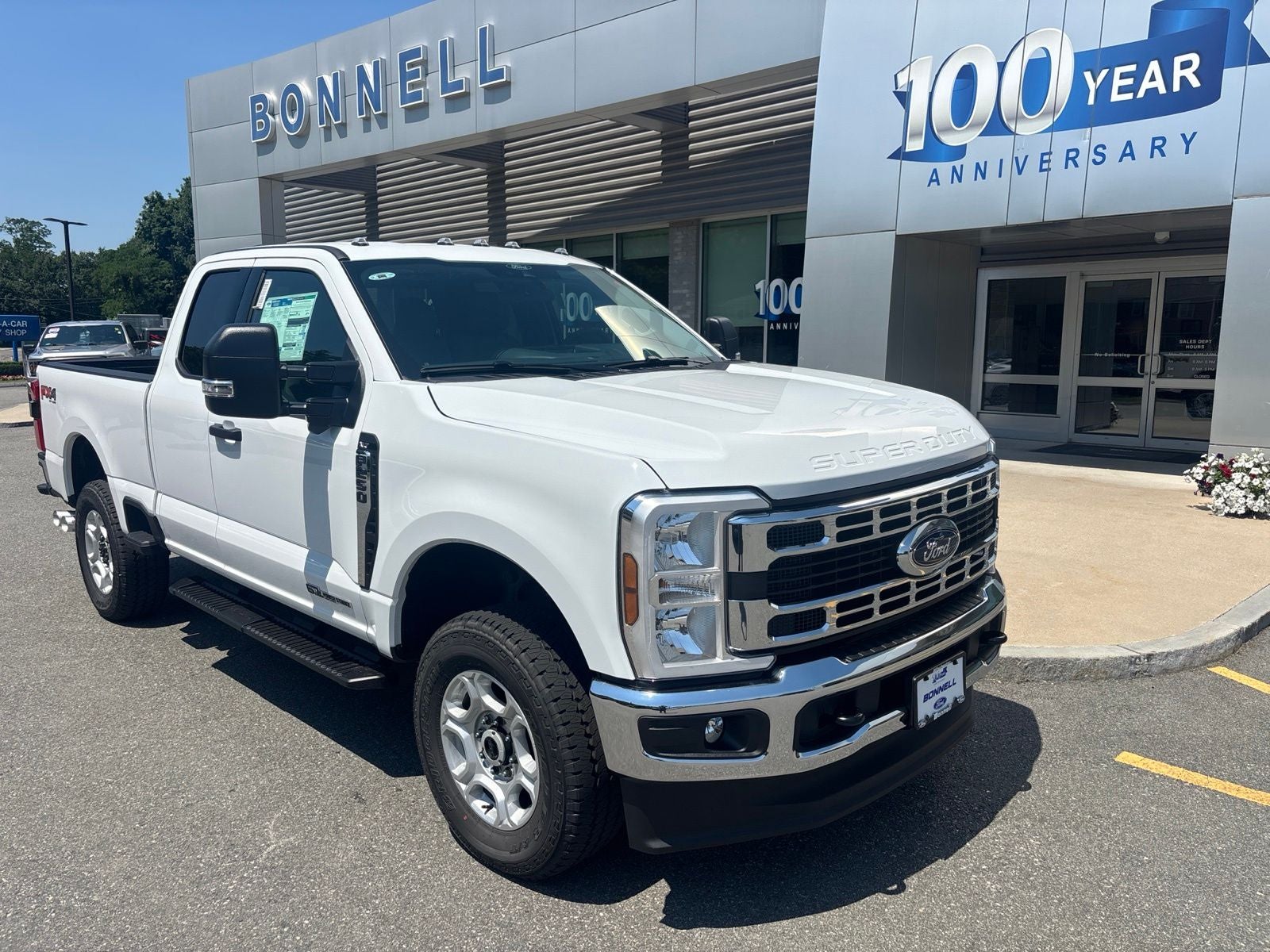 2026 Ford F-250SD XLT in Oxford White — front three-quarter view