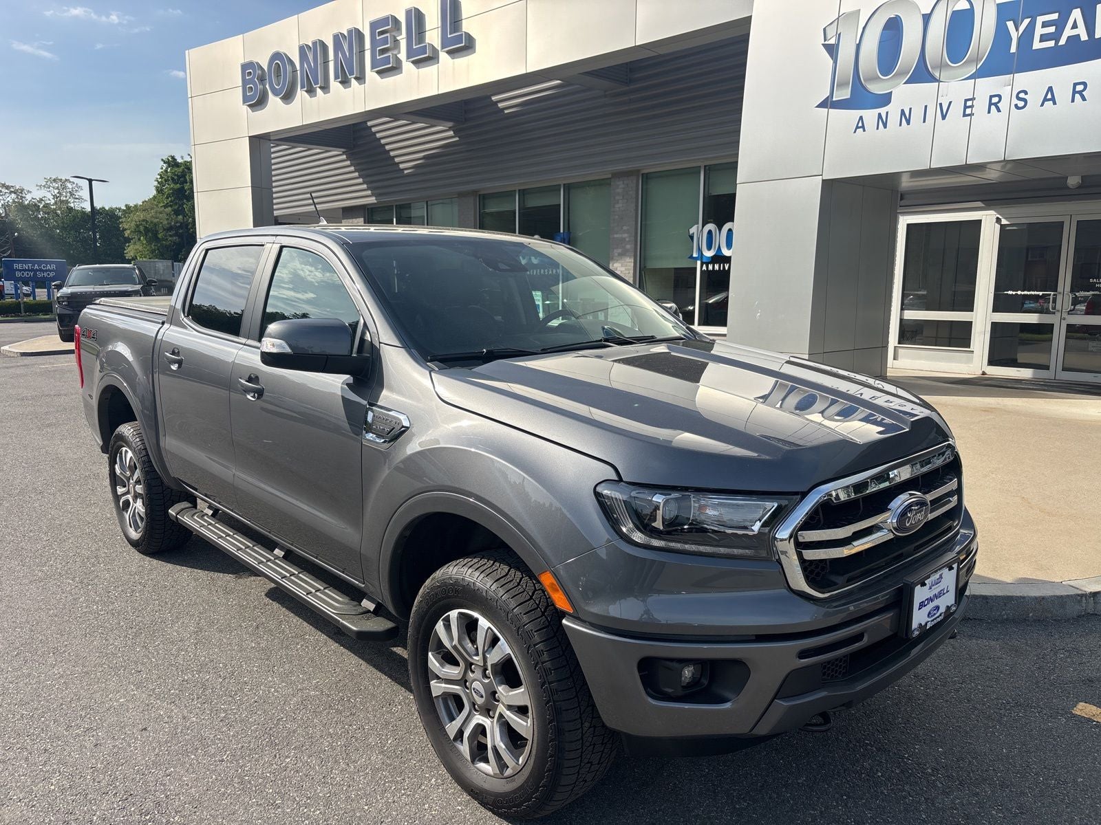 2023 Ford Ranger Lariat in Carbonized Gray Metallic — front three-quarter view