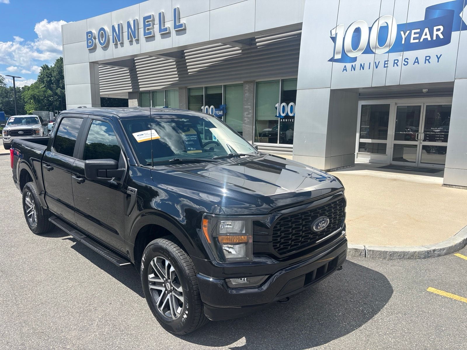 2023 Ford F-150 XL in Black Metallic — front three-quarter view