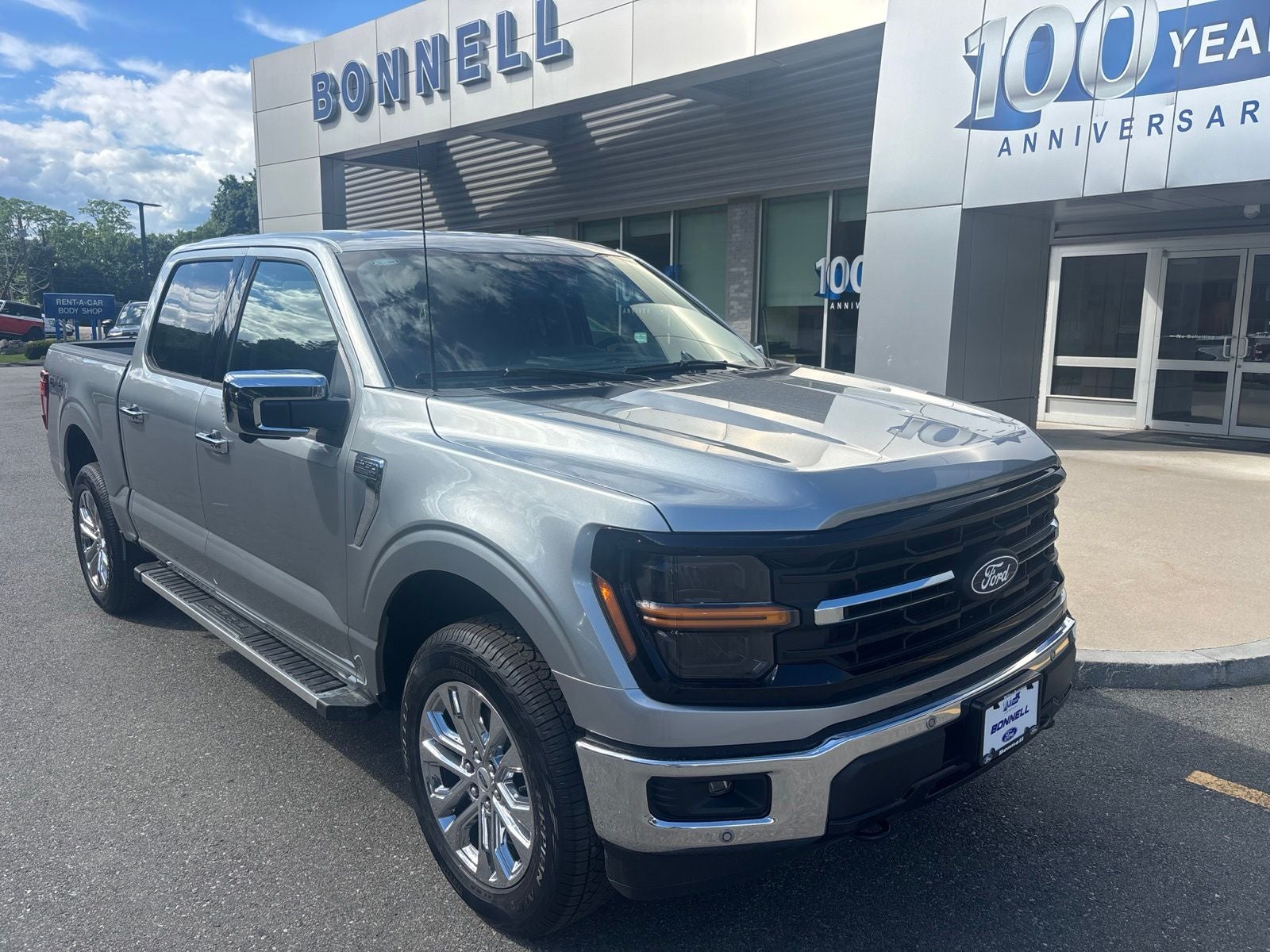 2026 Ford F-150 XLT in Iconic Silver Metallic — front three-quarter view