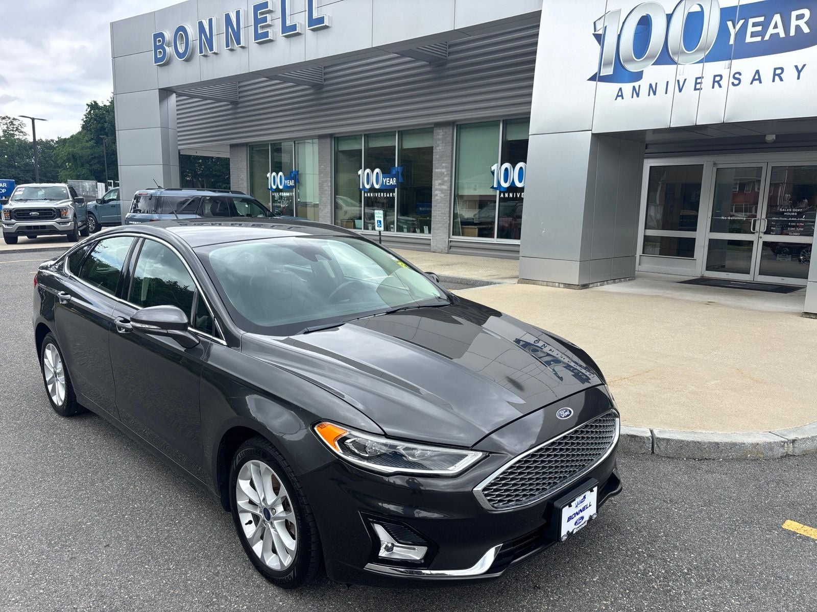 2019 Ford Fusion Energi Titanium in Magnetic — front three-quarter view