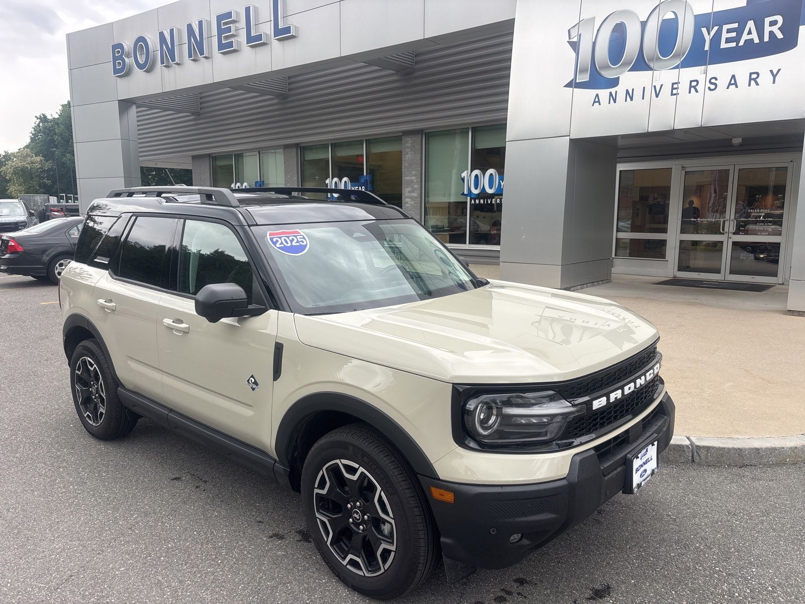 2025 Ford Bronco Sport Outer Banks in Desert Sand — front three-quarter view
