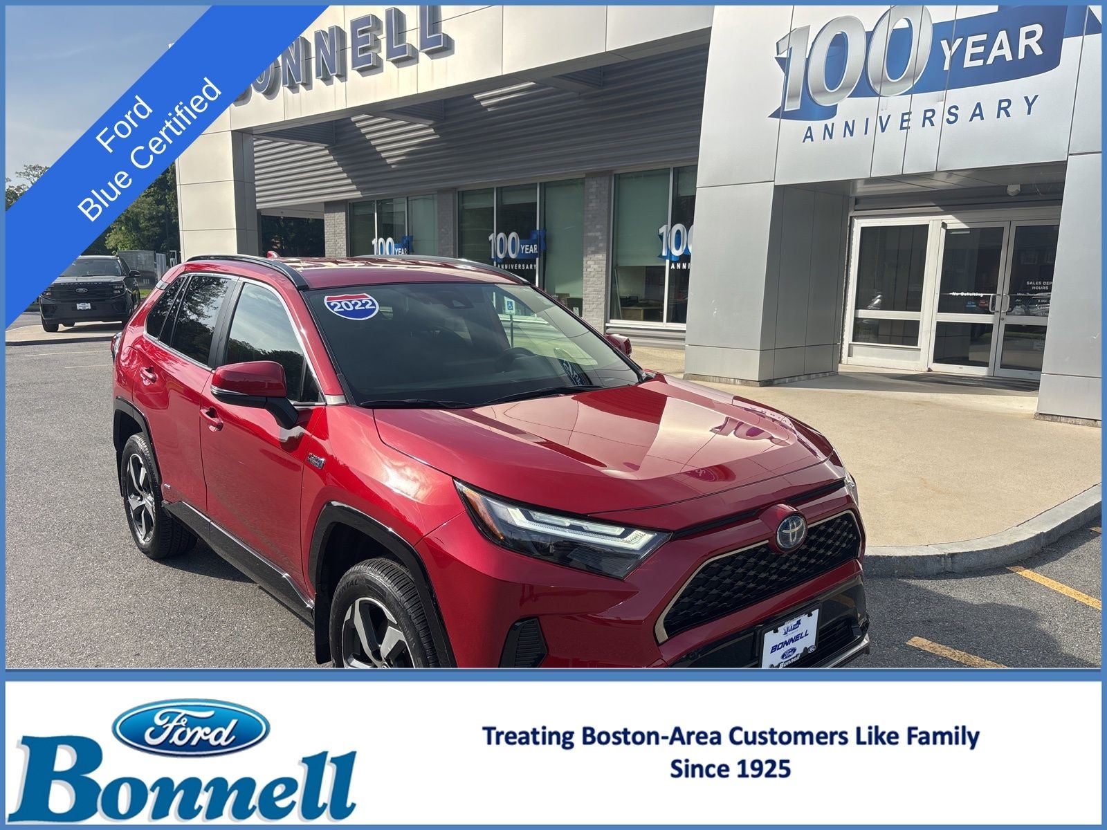 2022 Toyota RAV4 Prime SE in Supersonic Red — front three-quarter view